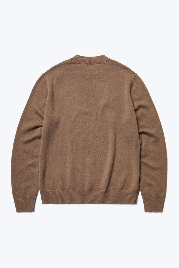 The back of the Photic Cashmere Sweater Brown, a relaxed crew neck jumper knitted in a wool/cashmere blend that is soft.