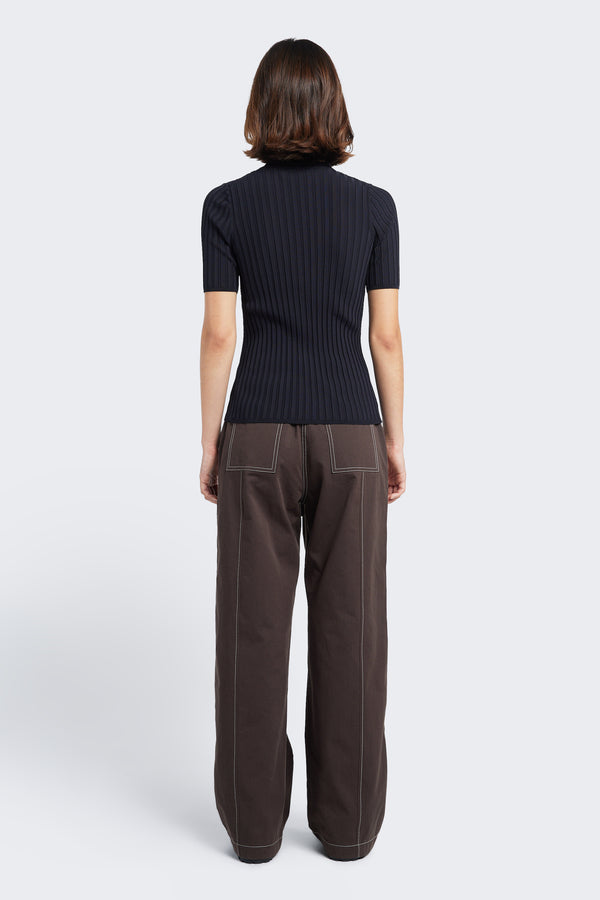 The back of the Delay Short Sleeve Knit a slim fit, V neck knit in a rib texture detail in a deep ink colour.