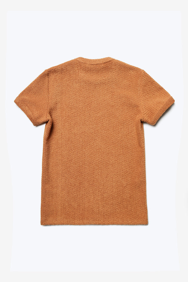 The back of the Exodus Tee, a classic slim fit ringer t-shirt in thick jersey in rusty brown.