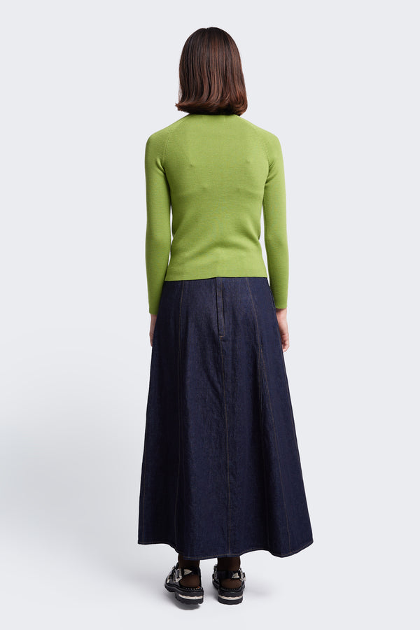 The back of the Idle Denim Skirt Indigo, featuring in seam side pockets and a centre back zip closure. This Godet Style Skirt is crafted from Japanese Denim.