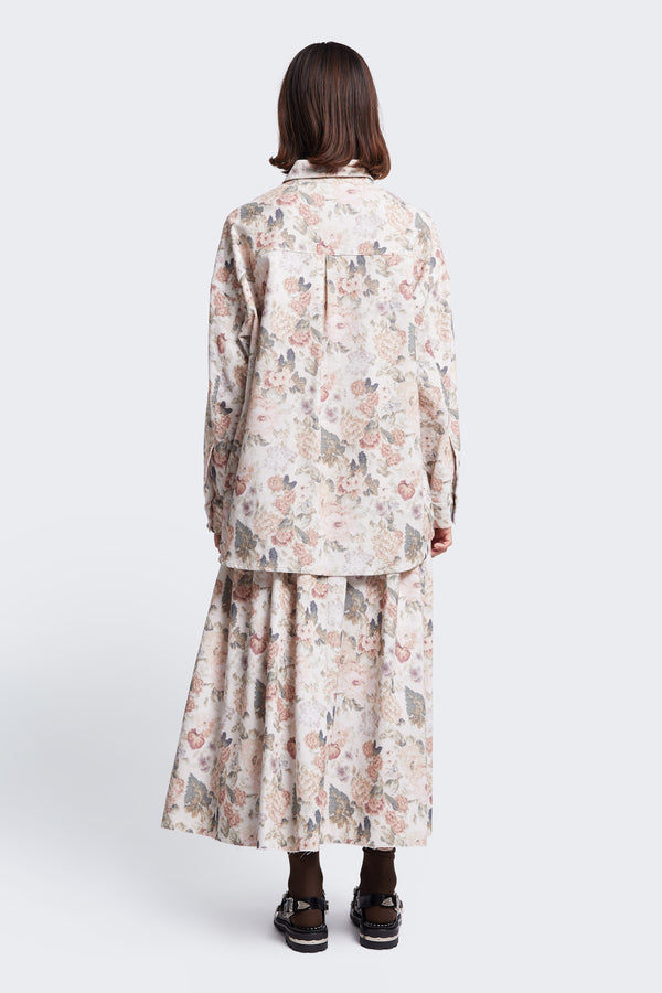 The back of the Resting Cord, a long sleeve shirt with scooped hem. Made from a fine wale corduroy in a Floral print reminiscent of traditional tapestry.