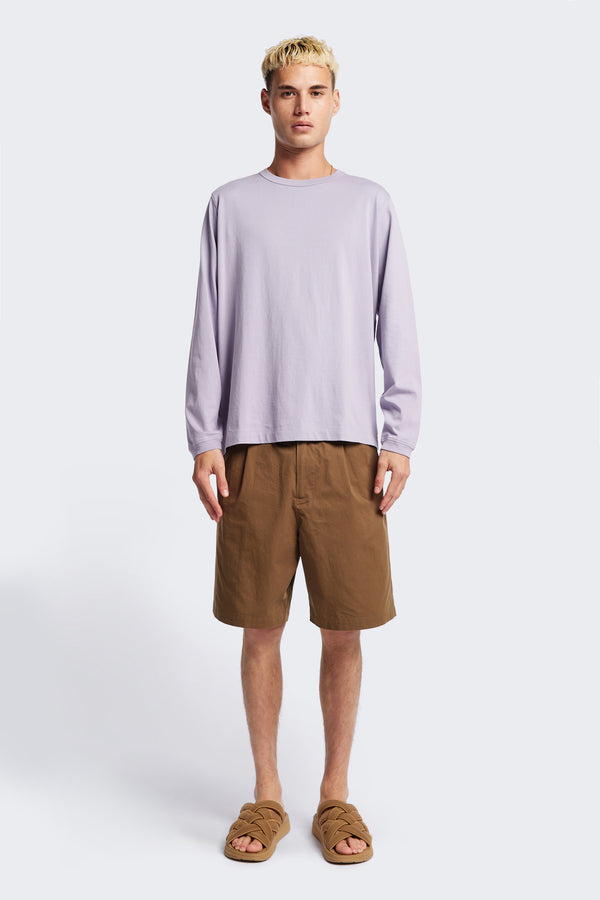 The Degree Pleat Short, a laidback and adaptable easy to weather summer short. Crafted in a brown washed cotton herringbone twill. Available in 5 sizes.