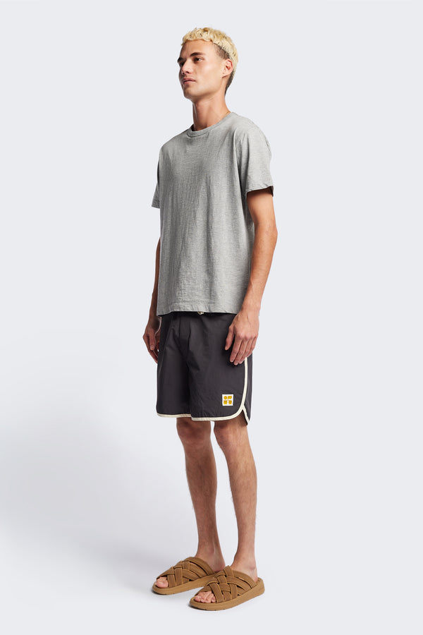 The Hybrid Board short in Slate grey, made from a functional technical cotton/nylon thats durable, stashable and quick-drying. Featuring back patch pocket with Velcro closure. Available in 5 sizes.