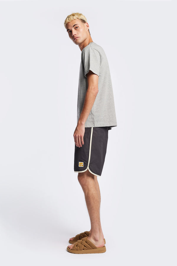 Side of The Hybrid Board short in Slate Grey, made from a functional technical cotton/nylon thats durable, stashable and quick-drying. Featuring back patch pocket with Velcro closure. Available in 5 sizes.