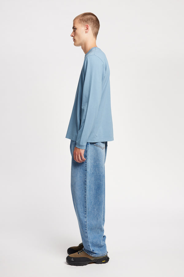 Side of The Offline T-shirt long sleeve crafted in soft, durable 100% organic cotton in Blue. Available in 5 sizes.