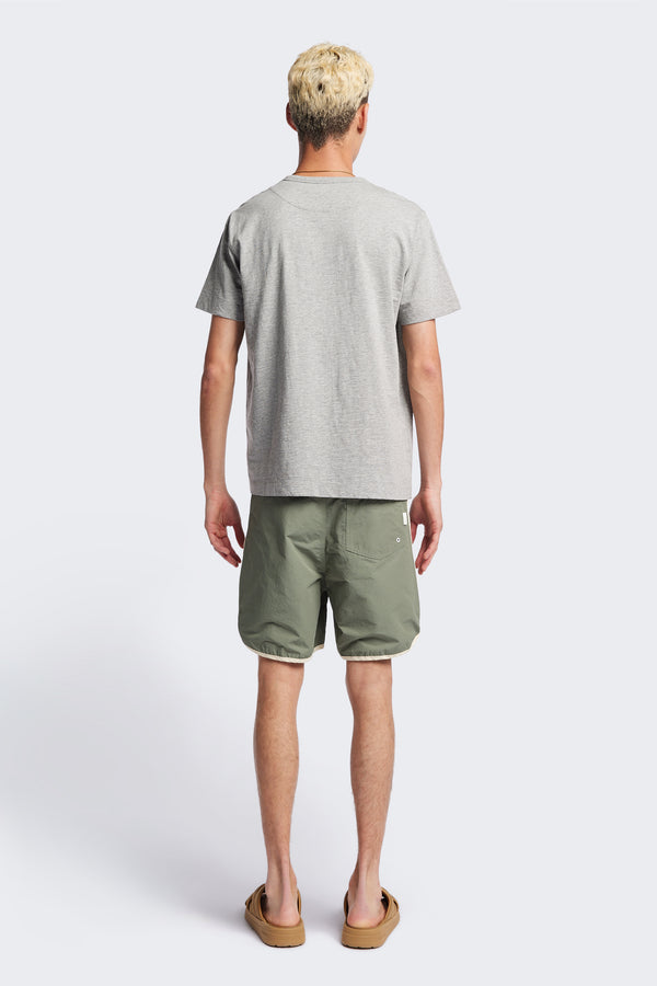 Back of The Radius T-Shirt is a traditional men's tee with 1 x 1 rib-bound cover-stitched neckline that's reinforced at the back. Made from 100% organic cotton in Heather Grey. Available in 5 Sizes.