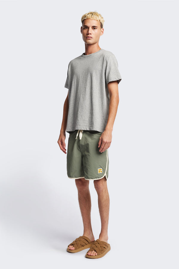 The Radius T-Shirt is a traditional men's tee with 1 x 1 rib-bound cover-stitched neckline that's reinforced at the back. Made from 100% organic cotton in Heather Grey. Available in 5 Sizes.