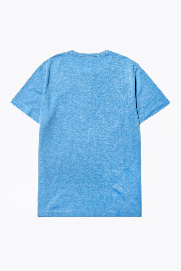 Back of The Stratus Henley T-shirt in Blue. Garment-dyed in soft cotton jersey with three-button placket and coverstitched hems. Available in 5 sizes.