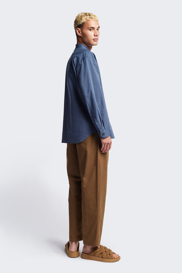 Blue Underground Long Sleeve Shirt in washed cotton herringbone twill with band collar and button placket. Available in 5 sizes.