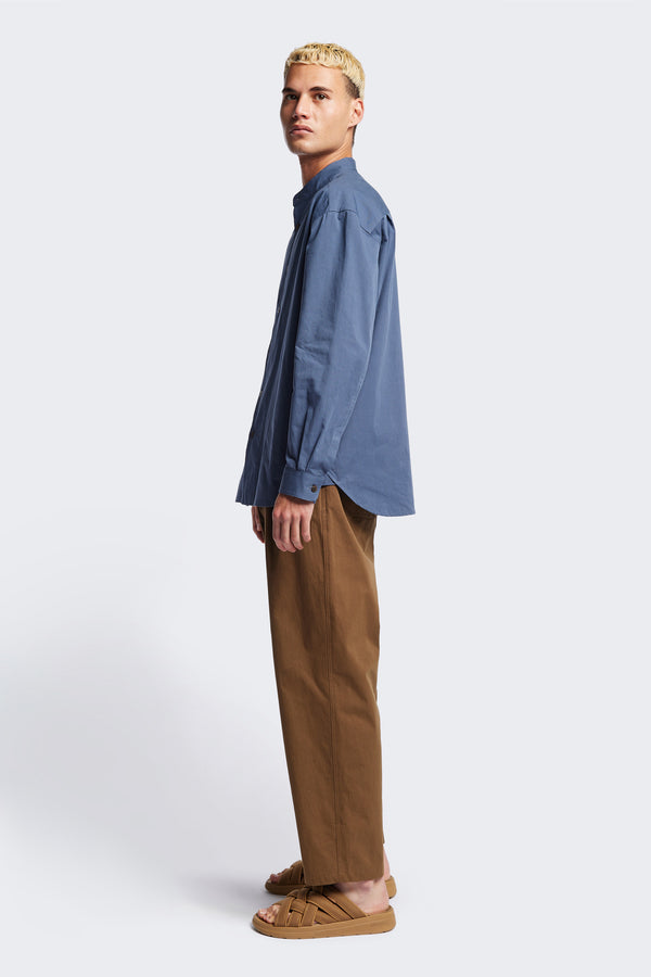 Blue Underground Long Sleeve Shirt in washed cotton herringbone twill with band collar and button placket. Available in 5 sizes.