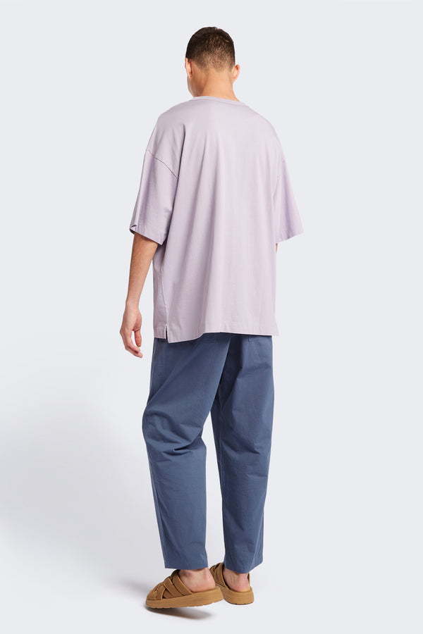 Men - Back of the Monolith Unisex T-Shirt Lilac. Oversized Relaxed fit. Available in 6 sizes.