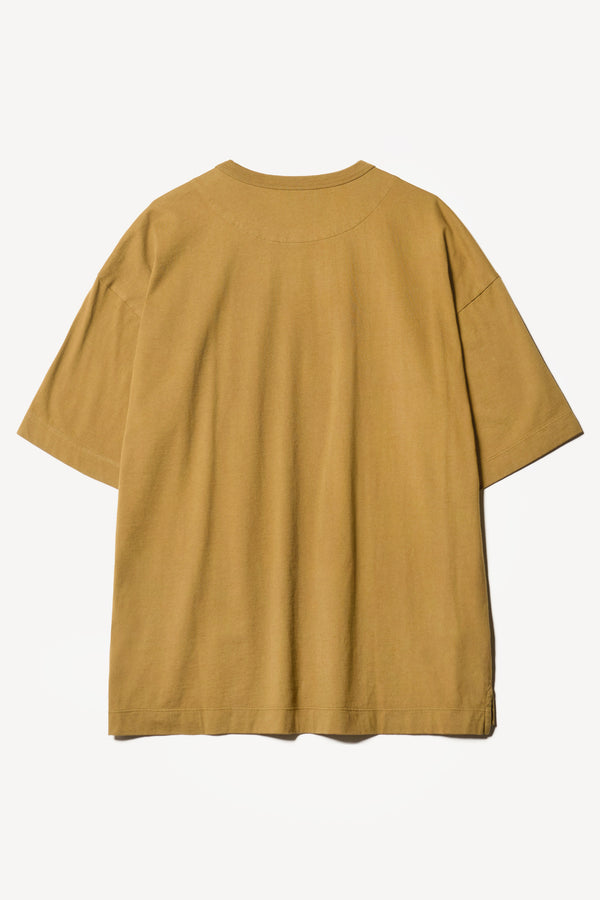 Flat Back of the Monolith Unisex Tee in Olive Oil. Oversized relaxed fit. Available in 6 sizes. Made from 100% Organic Cotton.