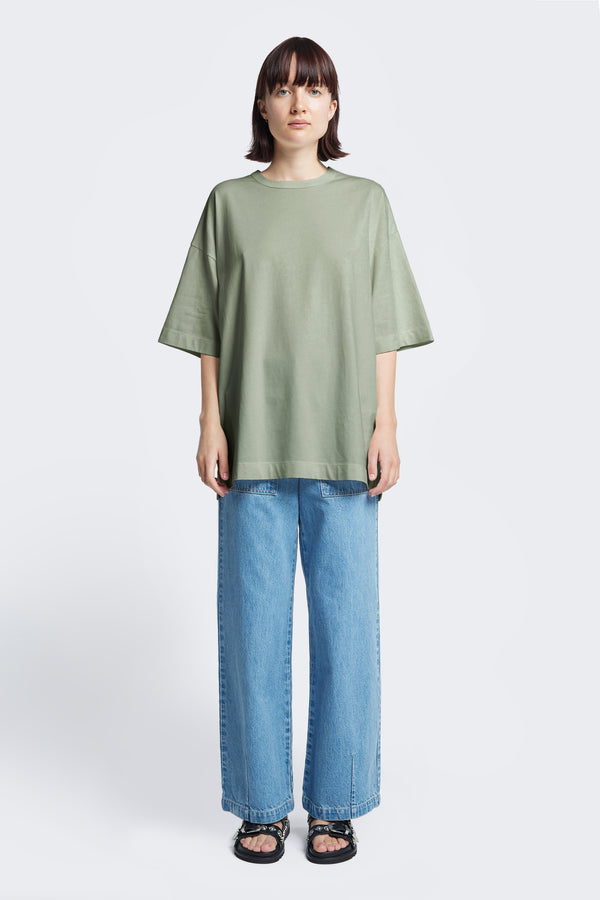 Women Monolith Unisex Tee Sage Green. Oversized relaxed fit. Available in 6 sizes.