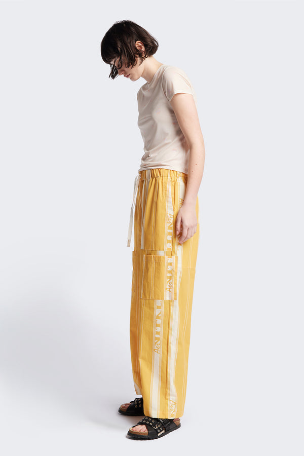 Side of the Aer Vital Print pant, a lightweight effortless summer style featuring an elastic waistband with a self-tie pull