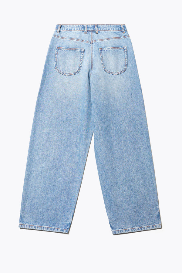 Flat Back of the Delphi Jean in mid blue fade, featuring a wide leg that tapers at the ankle, with an exposed button fly and Kloke-branded hardware. Available in 10 sizes.
