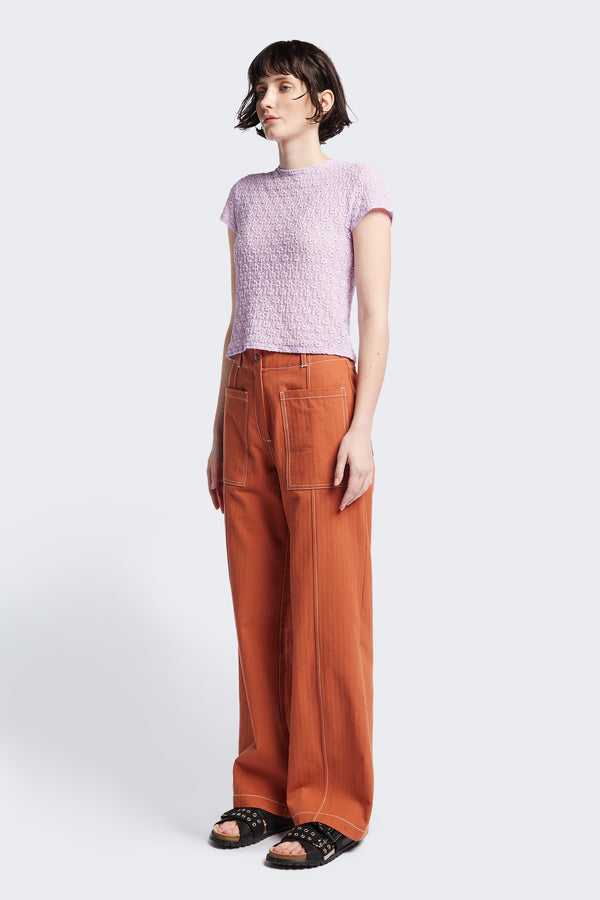 Delta pant in Burnt Orange, a tailored casual pant in premium cotton herringbone twill with contrast stitch panelling. Straight leg and tailored fit for a sleek, flattering polished finish. Available in 6 sizes.