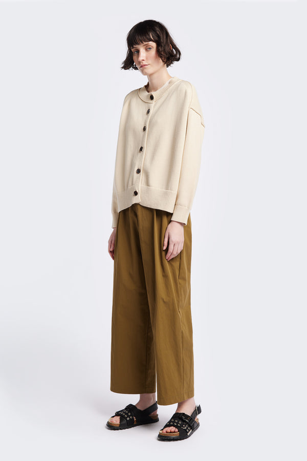 Flow Cardigan in Ecru Beige , relaxed boxy cardigan in soft cotton yarn with a crew neckline, button closure, and exaggerated dropped shoulders. Available in 5 sizes.