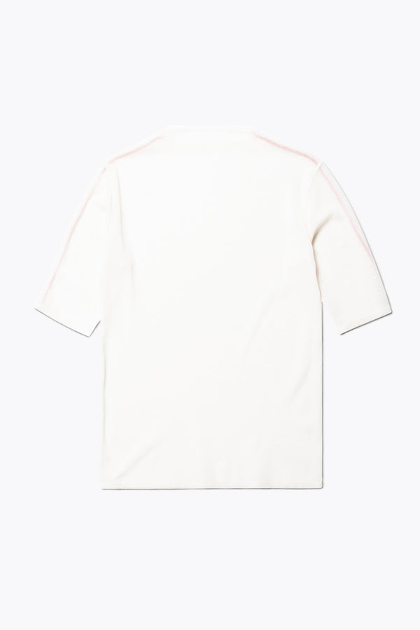 Flat Back of the Flow Mesh Short Sleeve Top in Ecru and Red. Featuring a high neckline, contrast flatlock seams, and sheer, lightweight fabric, perfect for layering.