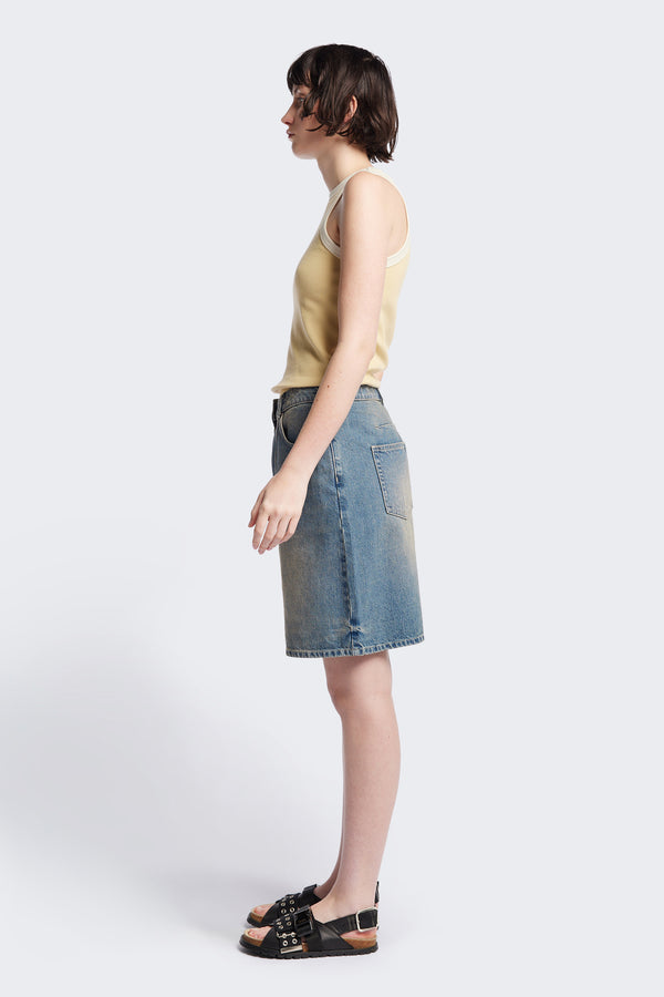 Side of Kloke Flux Racer Back Tank in Japanese ribbed cotton, featuring a slim fit and slight racer neckline, perfect for layering. Available in 5 sizes.