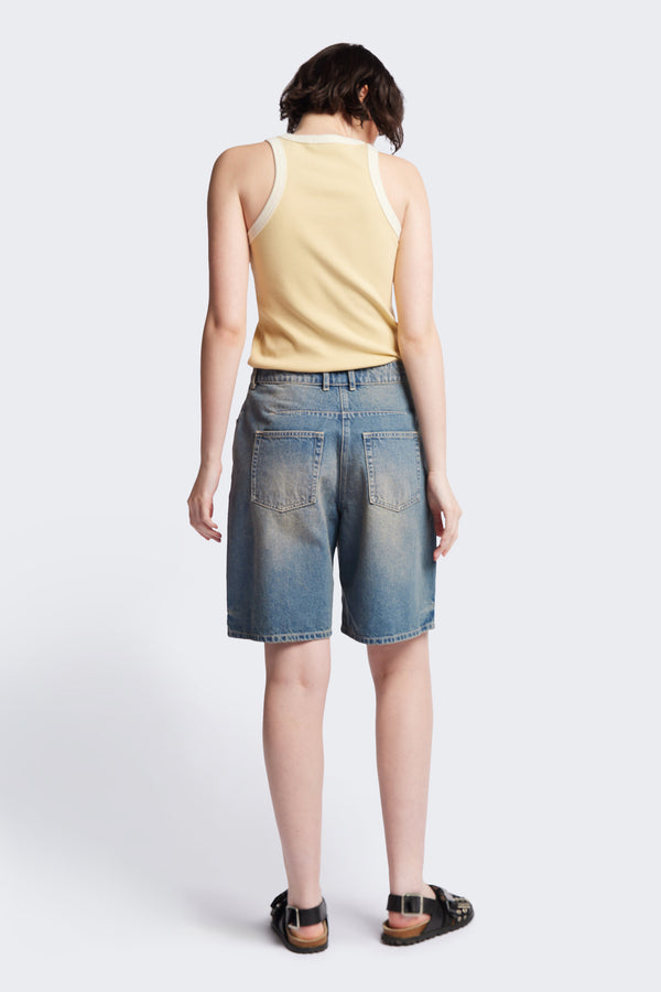 Back of Kloke Flux Racer Back Tank in Japanese ribbed cotton, featuring a slim fit and slight racer neckline, perfect for layering. Available in 5 sizes.