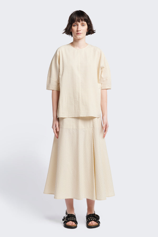 The Geos Panel Top in Ecru beige, textured cotton seersucker with gently shaped sculpted sleeves, perfect for summer. Available in 5 sizes.