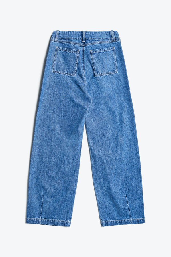 Back of The Interval Jean in Mid Wash. A well-loved Kloke classic. A straight, wide leg with higher rise waist, back yoke detail, and feature patch pockets. Crafted from premium 12oz Japanese denim. Available in 10 sizes.