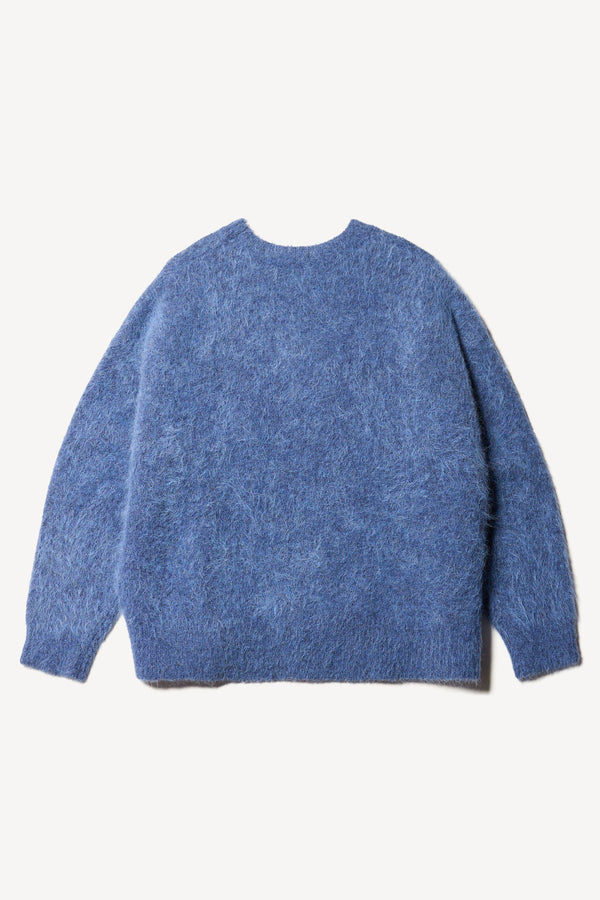 Flat back of the alpaca blend Laurel Crew Neck Knit Sweater in indigo marle