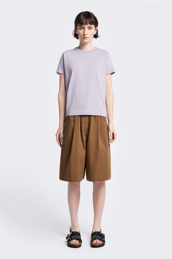 The Oceania Tee, a fitted style t-shirt cut from premium organic cotton jersey in Lilac Purple. Available in five sizes.