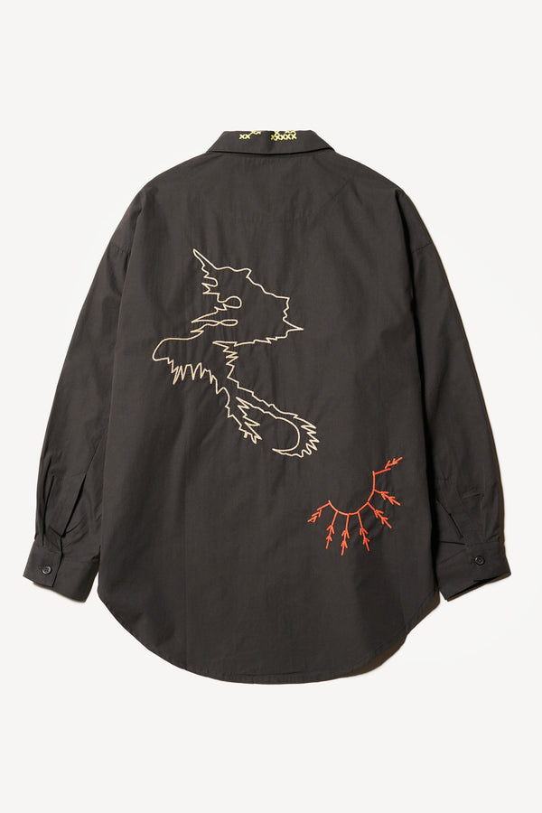 Flat back of Black One World Shirt with embroidered Arecibo motifs on collar, sleeves, and front. Classic collar and full placket.