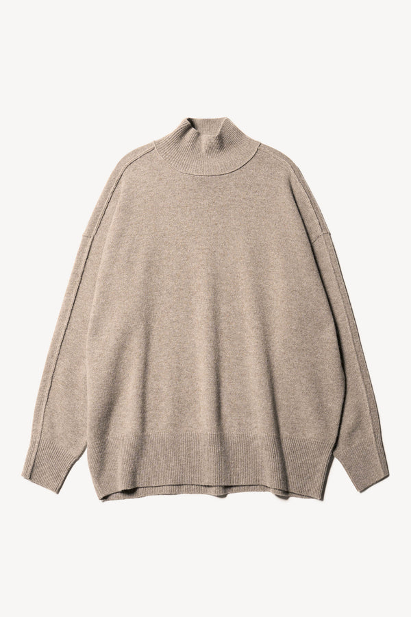 Flat front of the Overflow long knit, high neck wool blend sweater with exposed seams in taupe