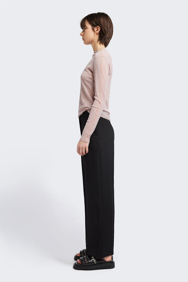 Side of the Rein Mesh Long Sleeve Top in Pale Mauve and Peach. Featuring a high neckline, contrast flatlock seams, and sheer, lightweight fabric, perfect for layering.