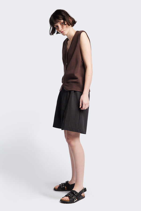 The Ritual Vest in Brown soft cotton rib, featuring a shallow V-neckline and centre front button placket. A versatile trans-seasonal layering piece, available in 5 sizes.