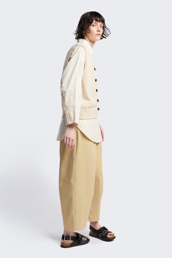 Side of the Ritual Vest in Ecru Beige soft cotton rib, featuring a shallow V-neckline and centre front button placket. A versatile trans-seasonal layering piece, available in 5 sizes.