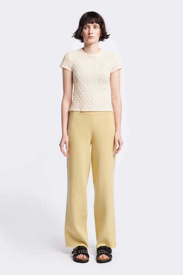 Ruse Top in Cream, slim fit with cap sleeves and a flower motif, made from soft cotton with added stretch for comfort. Available in 6 sizes.