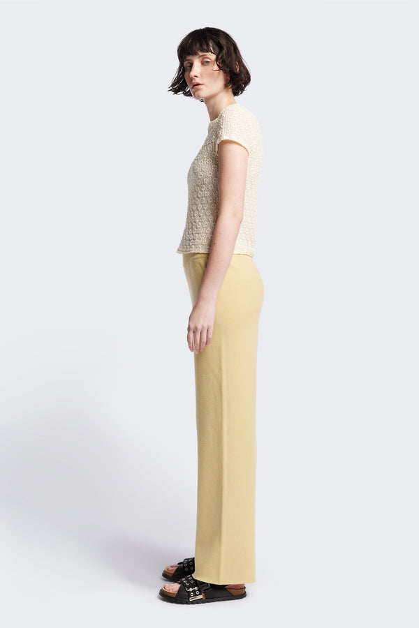 Side of the Ruse Top in Cream, slim fit with cap sleeves and a flower motif, made from soft cotton with added stretch for comfort. Available in 6 sizes.