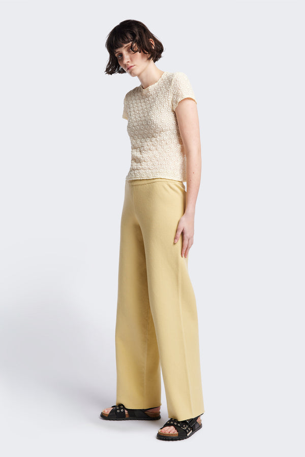 Ruse Top in Cream, slim fit with cap sleeves and a flower motif, made from soft cotton with added stretch for comfort. Available in 6 sizes.