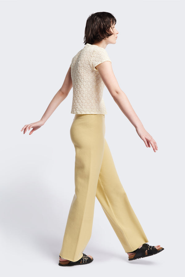 Side of the Ruse Top in Cream, slim fit with cap sleeves and a flower motif, made from soft cotton with added stretch for comfort. Available in 6 sizes.