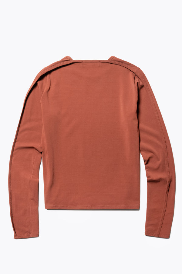 Flat back view of the Seclude long sleeve top in Brick. A Slim-fit crew neck top in soft cotton stretch, featuring an exposed bound seam curving across the back and sleeves.