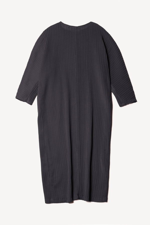 Flat back of black Sequel Dress with high neckline, midi length, and bracelet sleeves