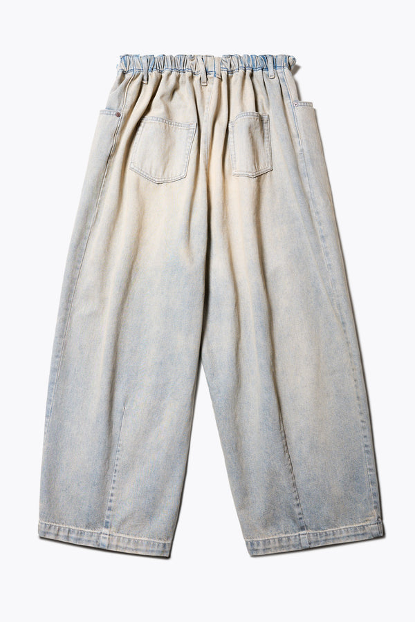 Flat Back of the Tunnel Denim Pant in Blue Pink Fade, with a relaxed fit, wide tapered leg, and elasticated waistband, made from lightweight Japanese cotton denim. Available in 5 sizes.