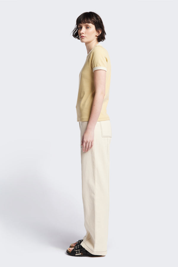 Side of the Veil Rib Tee a slim-fit ringer tee in ribbed cotton, featuring a vintage 70's-inspired design with contrasting neckline and sleeve details. Available in 5 sizes.