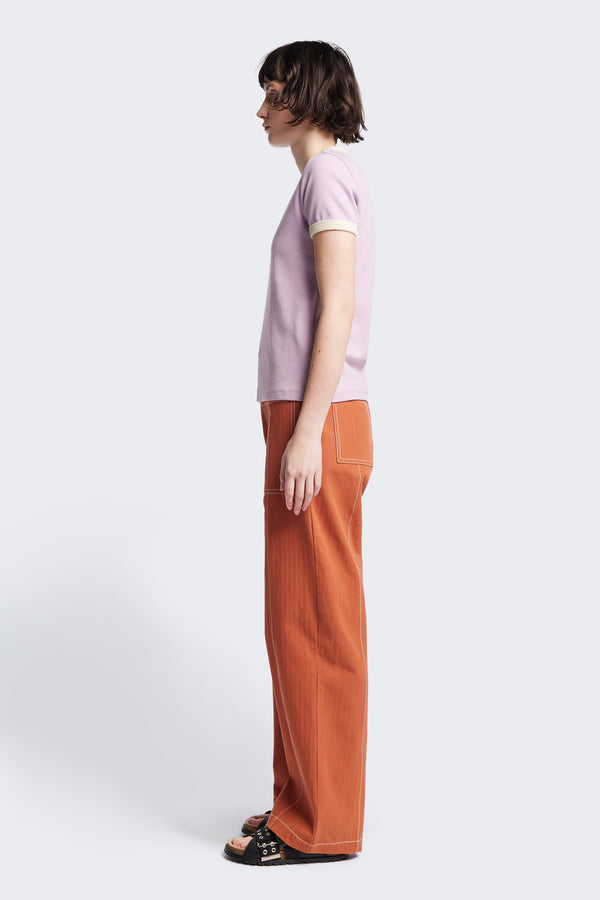Side of the Veil Rib Tee a slim-fit ringer tee in ribbed cotton, featuring a vintage 70's-inspired design with contrasting neckline and sleeve details. Available in 5 sizes.