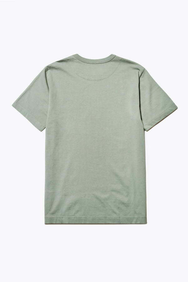 Back of The Radius T-Shirt is a traditional men's tee with 1 x 1 rib-bound cover-stitched neckline that's reinforced at the back. Made from 100% organic cotton in Sage Green. Available in 5 Sizes.