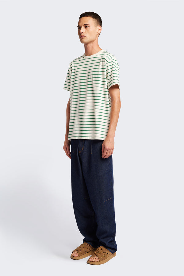 The Radius T-Shirt Green and White Stripe is a classic tee with a traditional fit that's comfortable and relaxed. Crafted from a high-grade organic cotton.