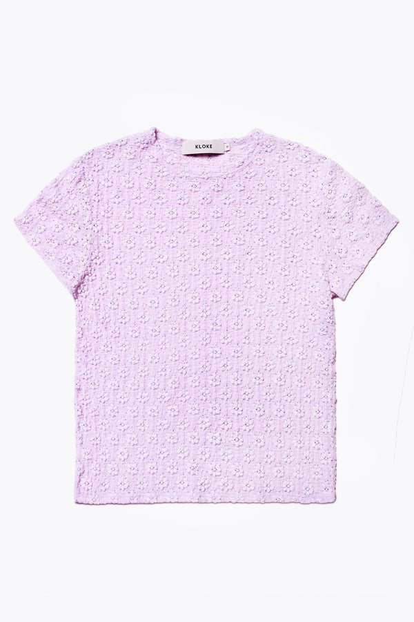 Ruse Top in Lilac, slim fit with cap sleeves and a flower motif, made from soft cotton with added stretch for comfort. Available in 6 sizes.
