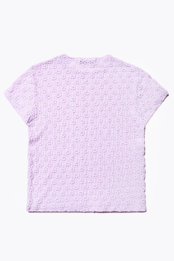 Back of the Ruse Top in Lilac, slim fit with cap sleeves and a flower motif, made from soft cotton with added stretch for comfort. Available in 6 sizes.