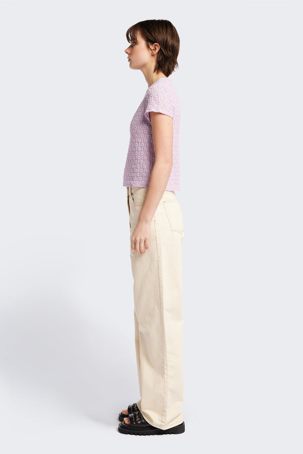 side of the Ruse Top in Lilac, slim fit with cap sleeves and a flower motif, made from soft cotton with added stretch for comfort. Available in 6 sizes.
