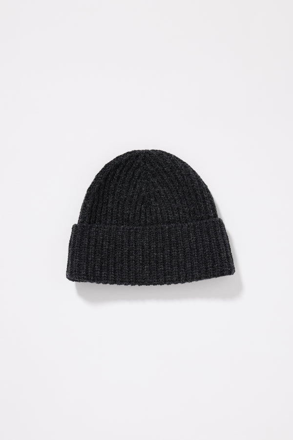 Charcoal Fading Beanie flat lay showing ribbed half-cardigan knit construction and contemporary proportions in RWS certified Merino