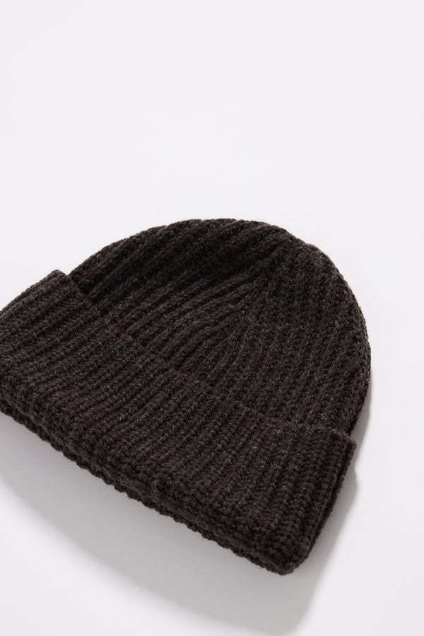 Coffee Fading Beanie flat lay showing ribbed half-cardigan knit construction and contemporary proportions in RWS certified Merino