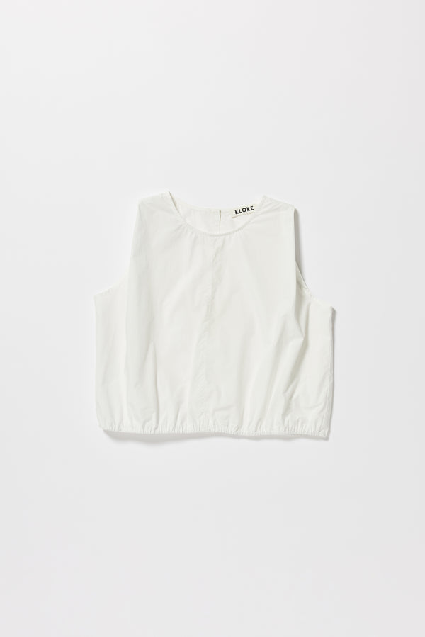 Flat front of the Lambent Top back view showing round neckline and centre-front seam detail